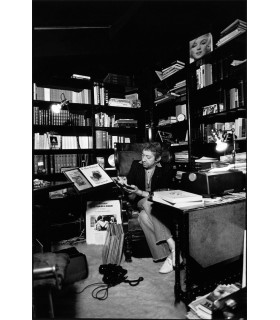Serge Gainsbourg in his library by Tony Frank